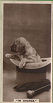 The cigarette cards in the set are : and show candid photos of dogs, cats, horses, monkeys, etc., together with whimsical captions. 1 Hush Thee, My Baby., 2 Tug-of-War., 3 Chip of the Old Block. 4 Give a Poor Dog a Bone., 5 You Lucky Dog., 6 In Hot Water., 7 Was That a Mouse?, 8 Somebody's Darling., 9 My Bite Next., 10 The Proud Mother., 11 A Bone of Contention., 12 Nurse and Baby., 13 Diogenes., 14  Tea for Two., 15 I Want to Be Happy., 16 What Big Ears You've Got!, 17 A Bone to Pick with You., 18 Tramps., 19 Wake Up, Pussy., 20 Happy Family. 21 Why Muzzle Me?, 22 The Three (Dis)Graces., 23  Feasting Together., 24  The Glass of Venus, 25  Just from Market.  26 In Charge. , 27 The Buck.  Cards size is approximately 1-3/8"" x 2-5/8"",
