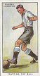 The cigarette cards in the set are: 1 How to kick 2 The volley 3 Kicking to swerve the ball 4 The corner kick 5 Free kick on goal 6 The penalty kick 7 Goal kick 8 When not to shoot 9 Heading 10 The kick-off 11 The long throw-in 12 Throw-in on attack 13 Defensive throw-in 14 Trapping the ball 15 Bridging the ball down 16 Taking the pace off the ball 17 Letting the ball run 18 Keeping the ball on the ground 19 Dribbling with the inside of foot 20 Dribbling with the outside of foot 21 Running over the ball 22 Passing with outside of foot 23 Passing with inside of foot 24 Passing with the head 25 Passing into open space 26 The centre 27 Cross field pass 28 Passing down the middle 29 Triangular wing movement 30 When wing men should close in 31 'W' formation 32 Outside forward cutting in 33 Wing forward moving inside the back 34 Shooting on the run 35 The tackle 36 The shoulder charge 37 Wing halves marking inside forwards 38 Backs system of covering 39 Backs marking wing forwards 40 Back passing to half-back 41 Centre-half as third back 42 Passing back to goalkeeper 43 Advancing to check break-through 44 Goalkeeper going down to ball 45 Goalkeeper - when not to catch the ball 46 Fisting the ball over the bar 47 Goalkeeper fielding a shot 48 Defense at the corner kick 49 Receiving a penalty 50 Goalkeeper narrowing the goal